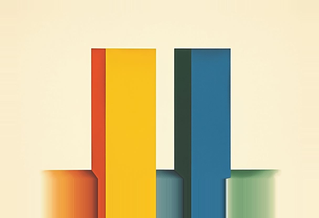 Two tall rectangular blocks, one orange-and-yellow and one dark green-and-blue, stand side by side on a pale cream background with soft blurred shadows beneath them.